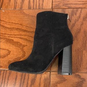 Sexy black high heeled booties